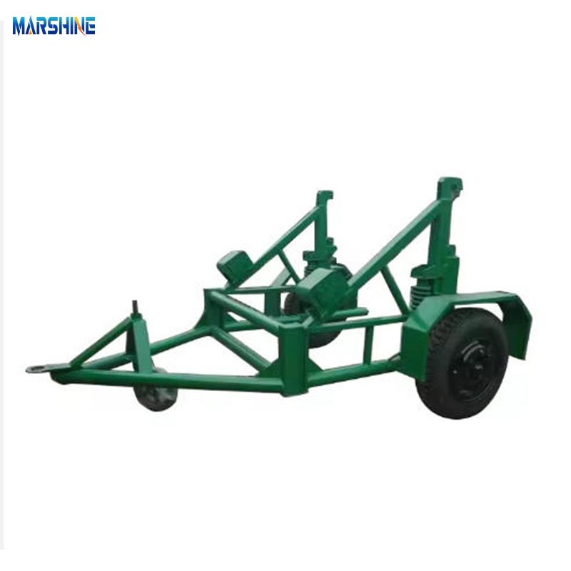 ما هي الخطوات المتضمنة في تحميل أسطوانات الكابلات على المقطورة؟